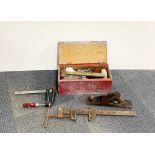 A vintage Stanley woodworking plain and other tools.