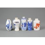 A group of five Chinese porcelain snuff bottles, H. 8cm.