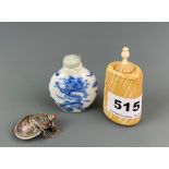 A Chinese carved bone snuff bottle together with a porcelain snuff bottles and a Tibetan snuff