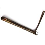 A police truncheon, L. 40cm.