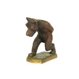 A 1930's bronze car mascot of Felix, H. 6cm. Tail A/F.