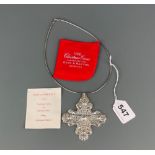 A Reed and Barton's 1972 sterling silver Christmas cross, H. 9cm.