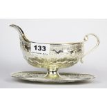 A heavy antique French hallmarked silver gilt lined saucier, L. 19cm, approx. 483g.