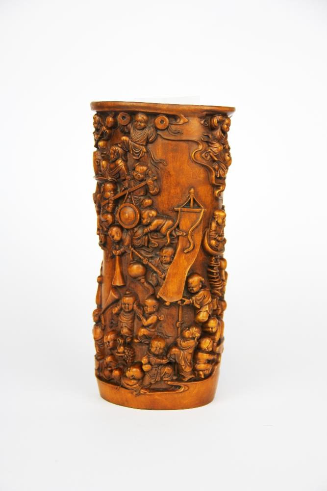 An intricately carved Chinese 'yellow wood' vase/brush pot decorated with children among clouds with - Image 2 of 3