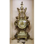 A large early 20th century French gilt brass mantel clock, H. 71cm.