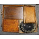 A quantity of antique wooden tea trays and two metal trays, largest 66cm x 46cm.