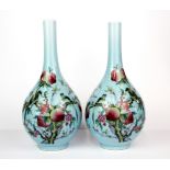 A pair of Chinese hand decorated porcelain vases, H. 28cm.