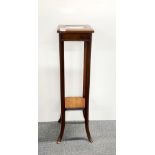 An Edwardian mahogany plant stand, H. 101cm.