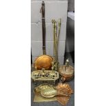 An Art Nouveau hammered copper crumb tray with other copper and brass items.