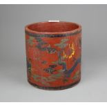 A Chinese painted wooden brush pot decorated with dragons, H. 19cm. Dia. 19cm.