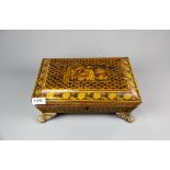 A rare Regency period chinoiserie decorated penwork box on gilt metal feet, 33 x 26 x 11cm.