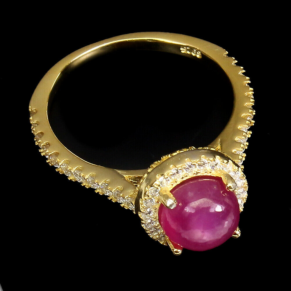 A 925 silver gilt ring set with a cabochon cut ruby and white stones, (L). - Image 2 of 2