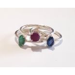 Three 925 silver stacking rings set with sapphire, ruby and emerald, (N).