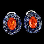 A pair of 925 silver earrings set with an oval cut fire opal and two rows of sapphires, L. 1.2cm.
