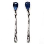 A pair of 925 silver drop earrings set with a pear cabochon cut sapphire and white stones, L. 5.