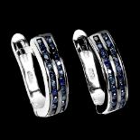 A pair of 925 silver sapphire channel set earrings, L. 2cm.