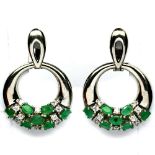 A pair of 925 silver drop earrings set with oval cut emeralds and white stones, L. 3.5cm.