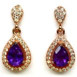 A pair of 925 silver rose gilt drop earrings set with pear cut amethysts and white stones, L. 2cm.