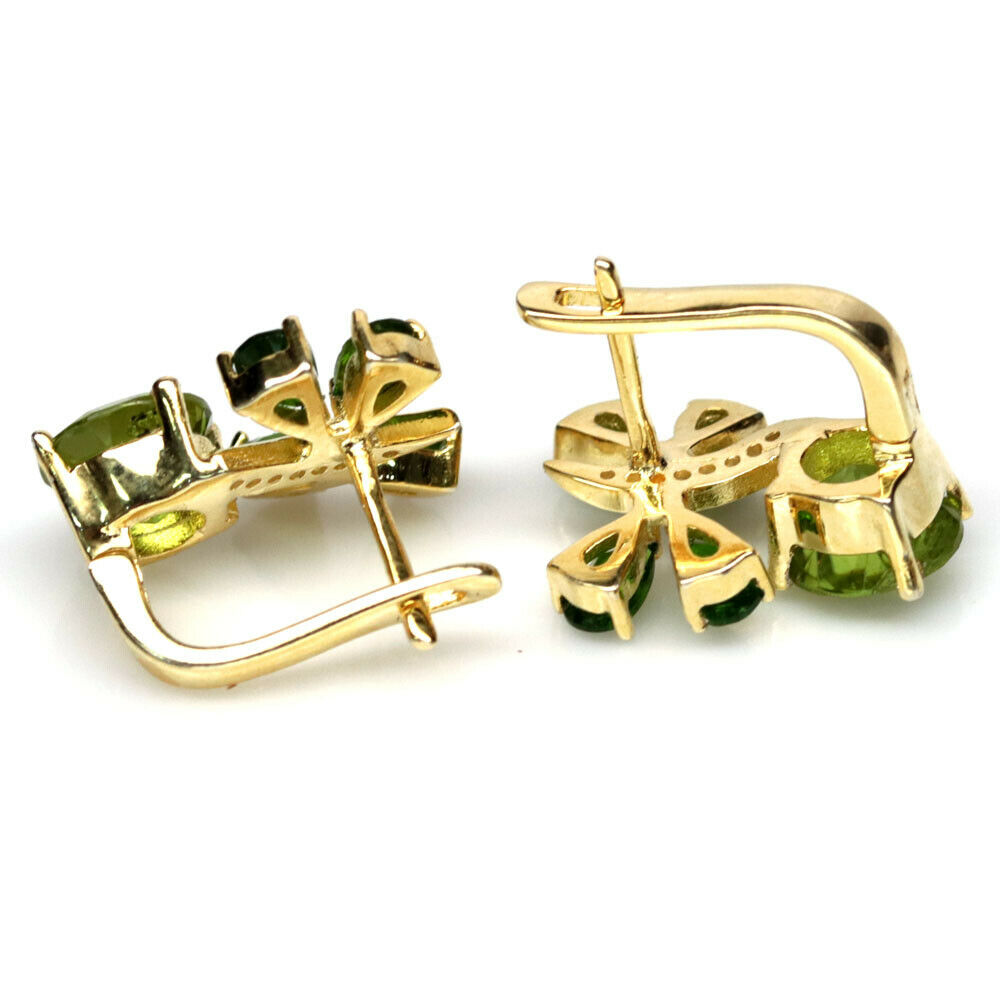 A pair of 925 silver earrings set with round cut peridots and chrome diopsides, L. 1.7cm. - Image 2 of 2