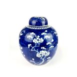 A large 19th/20th century Chinese hand painted 'Prunus' pattern porcelain jar and lid, H. 27cm.