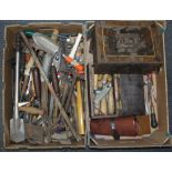 A box of mixed vintage tools.