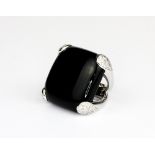 A Cavallo 18ct white gold (stamped 750) ring set with onyx and brilliant cut diamonds, (L).