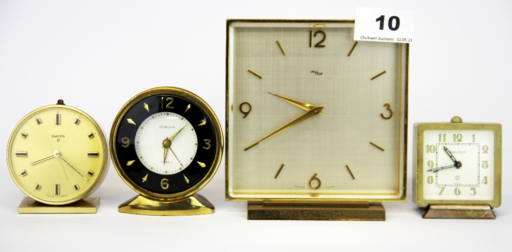 An Imhoff 1970's mantle clock, H. 13cm, together with three alarm clocks.