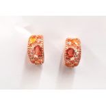 A pair of 925 silver rose gold gilt earrings set with fancy yellow and orange sapphires and white