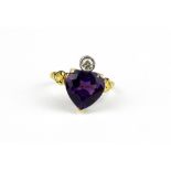 A yellow metal (test high carat gold) set with a heart cut amethyst and a brilliant cut diamond, (