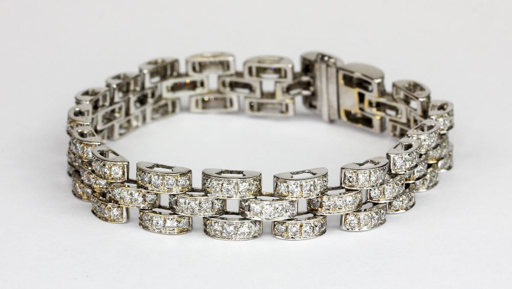 A 18ct white gold (stamped 18K) bracelet set with brilliant cut diamonds, approx. over 6ct,