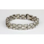 A 18ct white gold (stamped 18K) bracelet set with brilliant cut diamonds, approx. over 6ct,