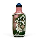 A lovely Chinese three layer carved Peking cameo glass snuff bottle, H. 9cm.