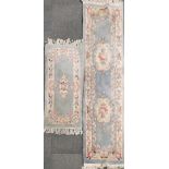 Two Chinese washed wool runners, largest 67 x 250cm.