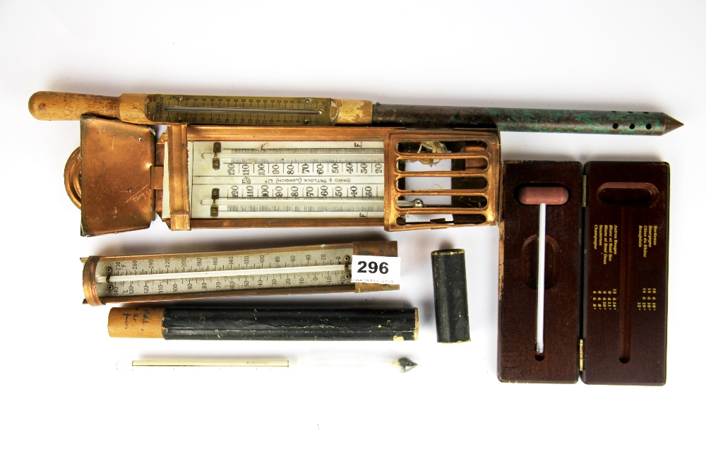A group of antique thermometers.