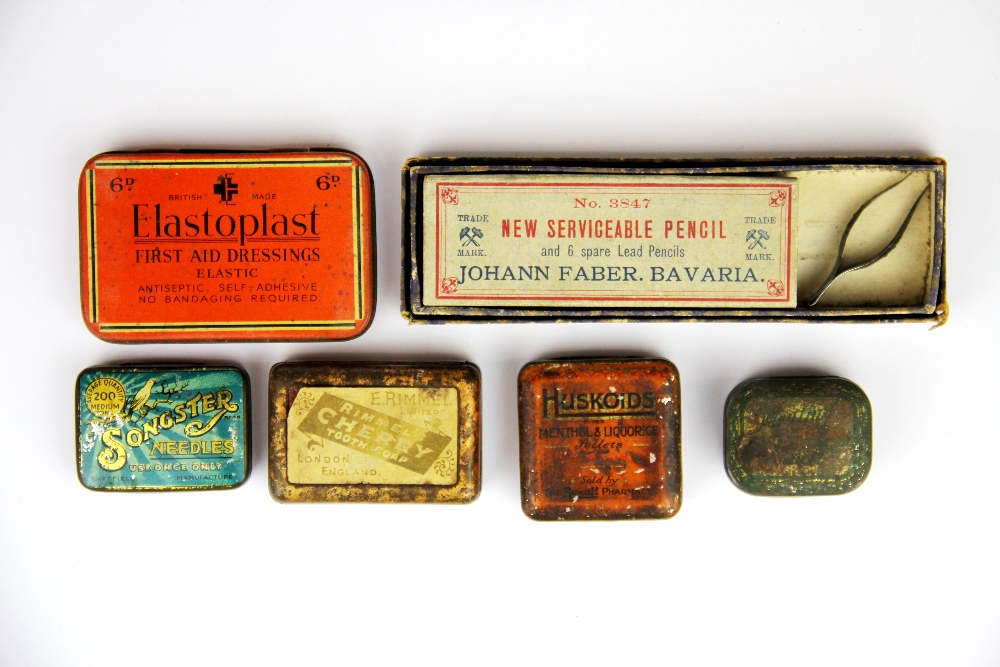 A small group of advertising tins, etc.