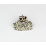 A 9ct white gold Royal Navy enamelled sweetheart brooch set with diamonds, 2.2 x 2cm.