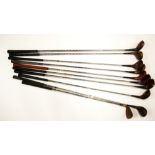 A quantity of MacGregor, Spalding golf clubs together with Aldridge, Wilson, Penfold and Dunlop golf