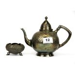 An Elkington silver plated coffee pot and an Indian white metal bowl.