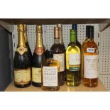 A group of mixed vintage champagne, wine and whiskey.