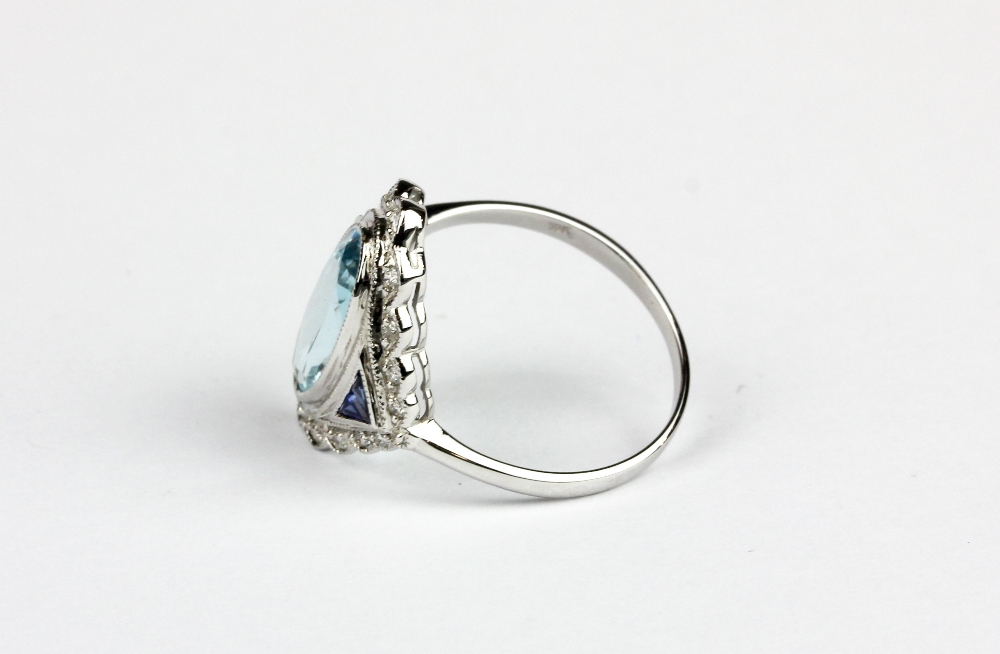 An 18ct white gold (stamped 18k) ring set with an oval cut aquamarine and sapphire and diamond set - Image 2 of 2