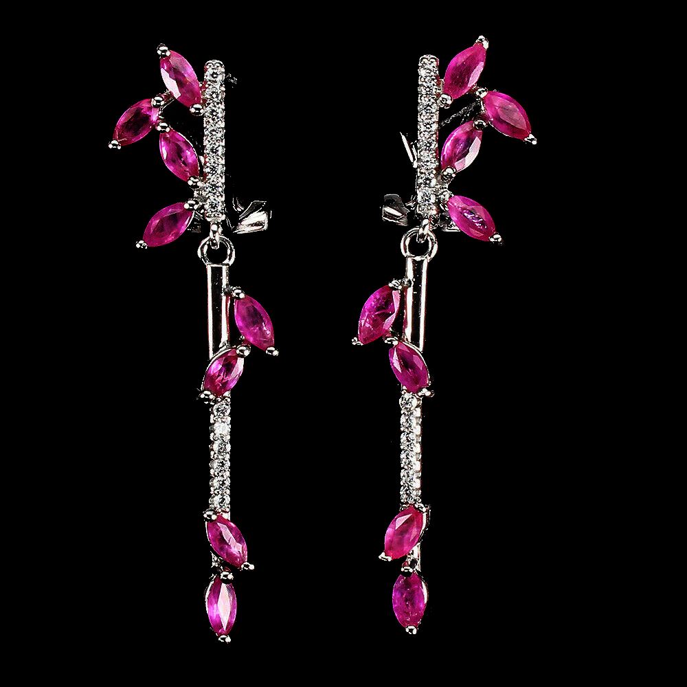 A pair of 925 silver drop earrings set with marquise cut rubies and white stones, L. 4.5cm.