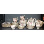 A very extensive Carrigan china 'Tree of Cashmere' pattern coffee service with side plates, larger