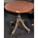 An unsual brass inlaid ormulu mounted coffee table, Dia. 49cm H. 55cm.
