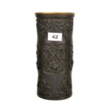 A 19th Century oriental bronze cylinder vase/brush pot with gilt brass insert, H. 24cm.