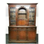 A mahogany bar bookcase, W. 140cm. H. 195cm.