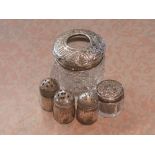 Two hallmarked silver topped dressing table items and sterling silver salt and pepper/pounce pots.