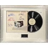 Autograph interest: A framed signed record by Fleetwood Mac, frame size 69 x 55cm. With