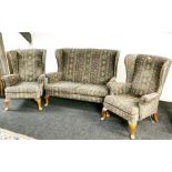 A mid 20th Century Parker Knoll wing back cottage suite.
