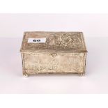 An early Victorian hallmarked silver jewellery casket with embossed decorated scenes of country