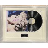 Autograph interest: A framed signed record by Madonna (American 1958 - present), frame size 69 x